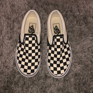 Vans black and white checkered slip ons